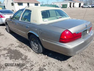 2005 Mercury Grand Marquis GS with VIN 2MEFM74WX5X614325, listed as a IAAI auction lot 41844701 with Not Provided miles and . Bid and sale history available at DreamBid. Image 3.