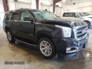 2019 GMC Yukon SLT with VIN 1GKS2BKC2KR238408, listed as a Copart auction lot 54893895 with 69,949 mi miles and Salvage Title. Bid and sale history available at DreamBid. Image 4.