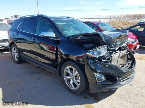 2018 Chevrolet Equinox Premier with VIN 3GNAXPEU5JL165915, listed as a IAAI auction lot 41597476 with 71,495 mi miles. Bid and sale history available at carsss.com. Image 1.
