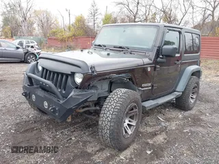 2013 Jeep Wrangler Sport with VIN 1C4AJWAG5DL679350, listed as a IAAI auction lot 40893582 with 61,191 mi miles and . Bid and sale history available at carsss.com. Image 2.