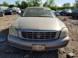 2001 Cadillac DeVille DHS z VIN 1G6KE57Y21U250470, wystawiony jako Copart lot #57334785 z przebiegiem 66 703 mil mil oraz Tytuł czysty. Historia ofert i sprzedaży dostępna na DreamBid. Obrazek 5.