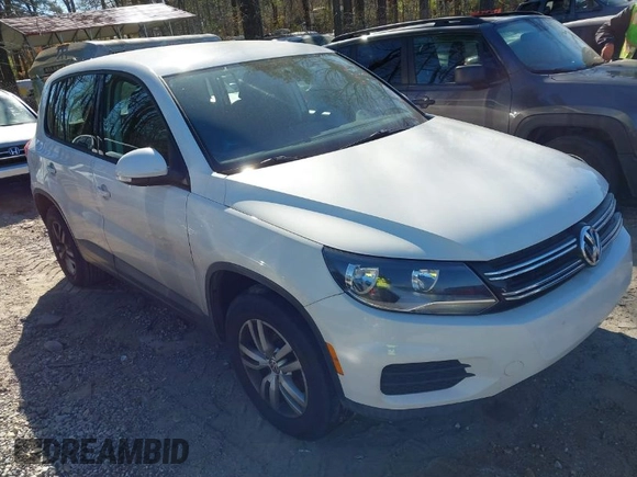 2012 Volkswagen Tiguan SE with VIN WVGAV7AX9CW590965, listed as a IAAI auction lot 41852407 with 153,953 mi miles and . Bid and sale history available at DreamBid. Image 1.