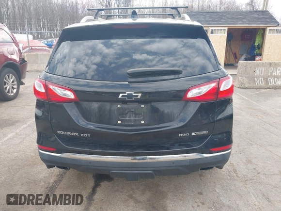 2018 Chevrolet Equinox Premier with VIN 2GNAXWEX6J6302935, listed as a IAAI auction lot 42065883 with 61,983 mi miles and . Bid and sale history available at carsss.com. Image 16.