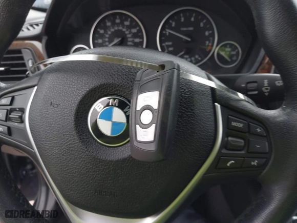 2014 BMW 3 Series 328i xDrive with VIN WBA3B5G57ENS06980, listed as a IAAI auction lot 42027714 with 110,773 mi miles. Bid and sale history available at carsss.com. Image 11.