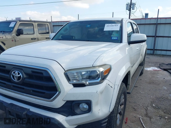 2017 Toyota Tacoma SR5 with VIN 5TFAZ5CN8HX043633, listed as a IAAI auction lot 41520703 with 104,711 mi miles and . Bid and sale history available at DreamBid. Image 17.