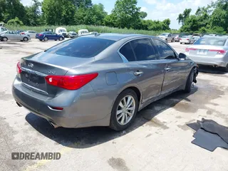 2014 Infiniti Q50 Sport with VIN JN1BV7AR4EM683887, listed as a IAAI auction lot 42550717 with 199,473 mi miles and . Bid and sale history available at DreamBid. Image 4.