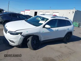 2020 Jeep Cherokee Latitude with VIN 1C4PJMCB0LD502665, listed as a IAAI auction lot 42165000 with 65,159 mi miles and . Bid and sale history available at DreamBid. Image 14.