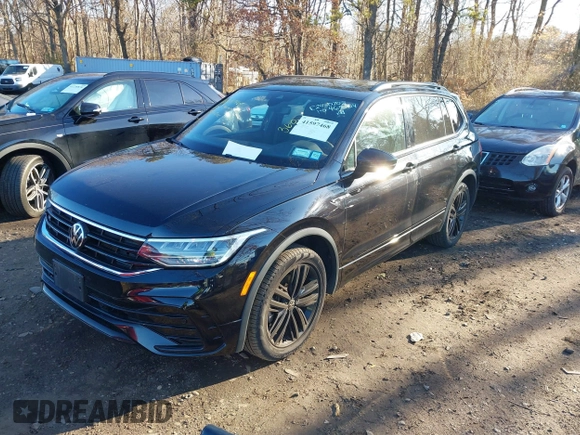2022 Volkswagen Tiguan SE R-Line Black with VIN 3VV8B7AX2NM029751, listed as a IAAI auction lot 41597468 with 29,674 mi miles and . Bid and sale history available at DreamBid. Image 2.