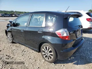 2012 Honda Fit Sport with VIN JHMGE8H52CS003715, listed as a Copart auction lot 63113204 with 79,744 mi miles and Salvage Title. Bid and sale history available at carsss.com. Image 2.