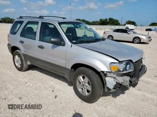 2007 Ford Escape XLS with VIN 1FMYU02Z87KB60530, listed as a Copart auction lot 61273345 with 57,574 mi miles and Salvage title. Bid and sale history available at DreamBid. Image 4.
