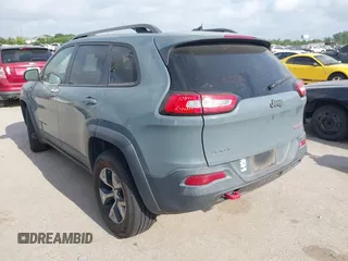 2014 Jeep Cherokee Trailhawk z VIN 1C4PJMBS2EW161276, wystawiony jako IAAI lot #42283358 z przebiegiem 135 201 mil mil oraz . Historia ofert i sprzedaży dostępna na DreamBid. Obrazek 3.