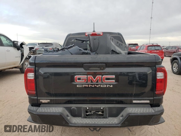 2024 GMC Canyon 4WD Elevation with VIN 1GTP6BEK7R1201100, listed as a Copart auction lot 86988794 with 10,935 mi miles and Salvage Title. Bid and sale history available at carsss.com. Image 6.
