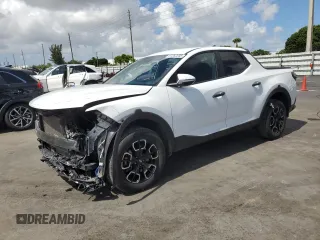 2022 Hyundai Santa Cruz SEL with VIN 5NTJB4AE4NH031912, listed as a Copart auction lot 61262235 with 59,733 mi miles and Salvage title. Bid and sale history available at DreamBid. Image 1.