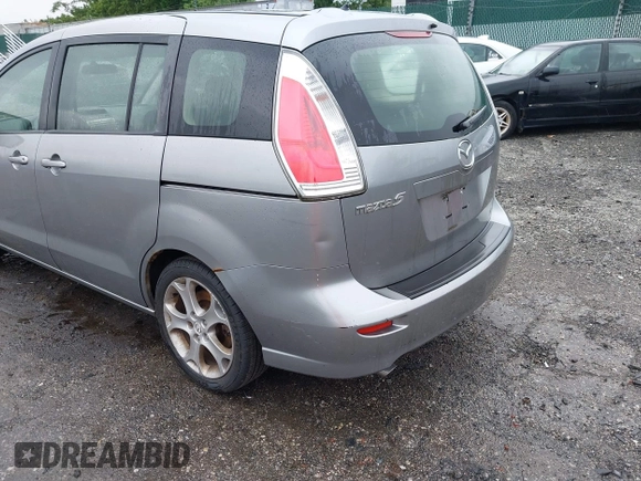 2010 Mazda 5 Sport with VIN JM1CR2WL9A0375192, listed as a IAAI auction lot 42621634 with 130,076 mi miles and . Bid and sale history available at DreamBid. Image 12.