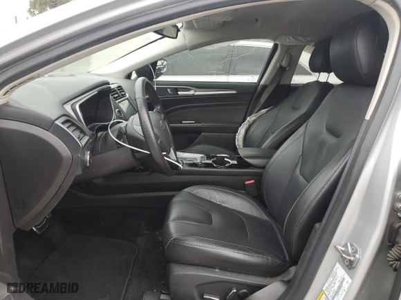 2016 Ford Fusion Energi Titanium with VIN 3FA6P0SUXGR320562, listed as a Copart auction lot 52647485 with 73,931 mi miles and Salvage Title. Bid and sale history available at carsss.com. Image 7.
