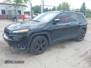 2016 Jeep Cherokee Sport with VIN 1C4PJMAB9GW323280, listed as a IAAI auction lot 42366989 with 151,332 mi miles and . Bid and sale history available at DreamBid. Image 2.