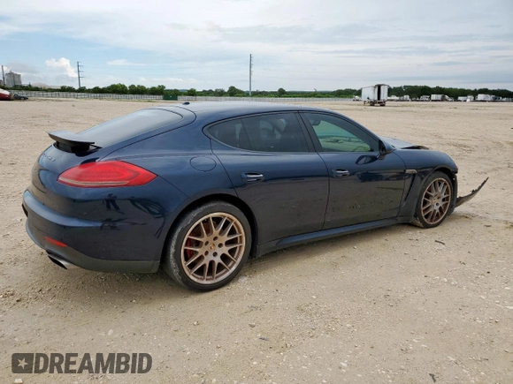 2014 Porsche Panamera с VIN WP0AA2A79EL012646, выставлен на аукционе Copart как лот 60818655 с пробегом 77 740 миль миль и Чистый • Clean title. История ставок и продаж доступна на DreamBid. Изображение 3.