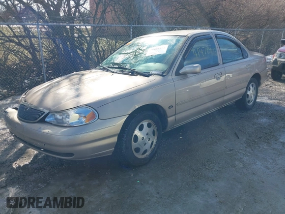 1999 Mercury Mystique GS z VIN 1MEFM6530XK635463, wystawiony jako IAAI lot #41478903 z przebiegiem 87 911 mil mil oraz . Historia ofert i sprzedaży dostępna na DreamBid. Obrazek 2.