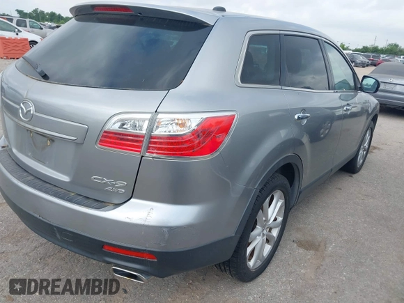 2012 Mazda CX-9 Grand Touring with VIN JM3TB3DAXC0345592, listed as a IAAI auction lot 42182735 with 168,725 mi miles. Bid and sale history available at carsss.com. Image 4.