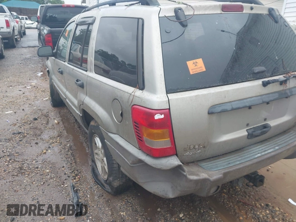2003 Jeep Grand Cherokee Laredo z VIN 1J4GW48S33C599693, wystawiony jako IAAI lot #42228885 z przebiegiem 257 551 mil mil oraz . Historia ofert i sprzedaży dostępna na DreamBid. Obrazek 3.