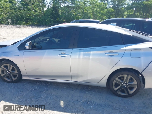 2020 Toyota Prius L Eco z VIN JTDKARFUXL3125434, wystawiony jako IAAI lot #42201623 z przebiegiem 58 609 mil mil oraz . Historia ofert i sprzedaży dostępna na DreamBid. Obrazek 14.