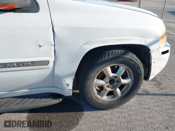 2003 GMC Envoy SLT with VIN 1GKES16S436243654, listed as a IAAI auction lot 42186690 with 125,315 mi miles and . Bid and sale history available at DreamBid. Image 13.