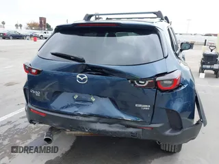2024 Mazda CX-50 2.5 Turbo with VIN 7MMVABXY1RN237106, listed as a IAAI auction lot 42117311 with 3,135 mi miles and . Bid and sale history available at DreamBid. Image 6.