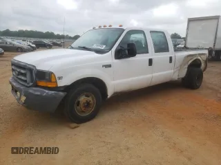 1999 Ford F-350 XL with VIN 1FTWW32FXXEB79284, listed as a Copart auction lot 53969905 with 241,082 mi miles and Salvage title. Bid and sale history available at DreamBid. Image 1.