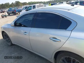 2014 Nissan Maxima S z VIN 1N4AA5AP6EC910967, wystawiony jako IAAI lot #42124722 z przebiegiem 111 986 mil mil oraz . Historia ofert i sprzedaży dostępna na DreamBid. Obrazek 14.
