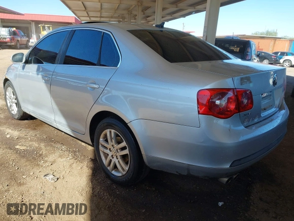 2007 Volkswagen Jetta Sedan 2.5L with VIN 3VWSG71K27M033082, listed as a IAAI auction lot 41819794 with 239,939 mi miles. Bid and sale history available at carsss.com. Image 3.