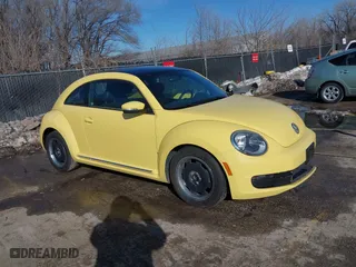 2012 Volkswagen Beetle 2.5L PZEV with VIN 3VWJP7AT9CM610530, listed as a IAAI auction lot 41388728 with 143,909 mi miles. Bid and sale history available at carsss.com. Image 1.