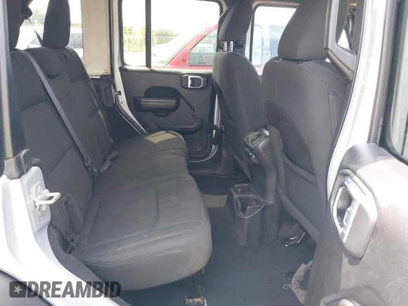 2022 Jeep Wrangler Unlimited Willys Sport with VIN 1C4HJXDM4NW175782, listed as a IAAI auction lot 42073544 with 129,299 mi miles and . Bid and sale history available at DreamBid. Image 8.