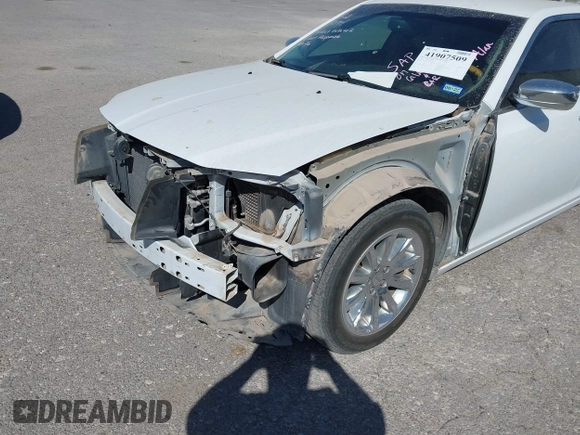 2014 Chrysler 300 with VIN 2C3CCAEG4EH312930, listed as a IAAI auction lot 41907509 with 128,940 mi miles. Bid and sale history available at carsss.com. Image 6.
