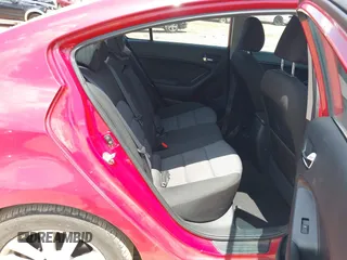 2014 Kia Forte EX z VIN KNAFX4A86E5087444, wystawiony jako IAAI lot #42177387 z przebiegiem 125 334 mil mil oraz . Historia ofert i sprzedaży dostępna na DreamBid. Obrazek 8.