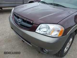 2001 Mazda Tribute LX with VIN 4F2CU08141KM10269, listed as a IAAI auction lot 42138704 with 166,825 mi miles and . Bid and sale history available at carsss.com. Image 6.