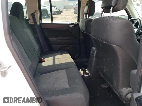 2012 Jeep Patriot Sport with VIN 1C4NJRBB9CD614936, listed as a Copart auction lot 56124675 with 194,590 mi miles and Salvage title. Bid and sale history available at DreamBid. Image 12.