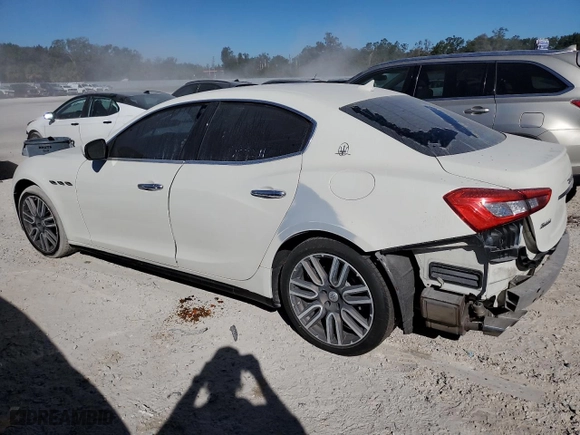 2018 Maserati Ghibli with VIN ZAM57XSA4J1295191, listed as a Copart auction lot 82411644 with NaN miles and Salvage Title. Bid and sale history available at carsss.com. Image 2.