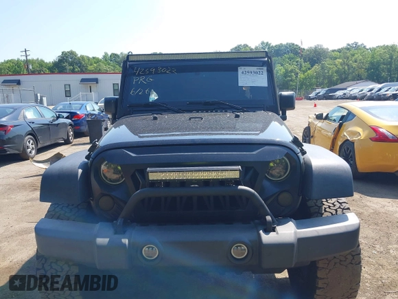 2015 Jeep Wrangler Unlimited Sport with VIN 1C4BJWDG2FL518487, listed as a IAAI auction lot 42593022 with 161,991 mi miles and . Bid and sale history available at DreamBid. Image 12.