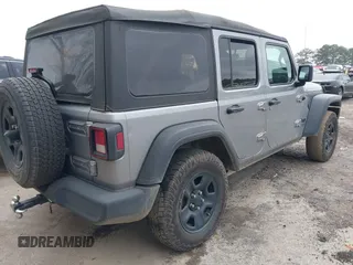 2021 Jeep Wrangler Unlimited Sport S with VIN 1C4HJXDN3MW717266, listed as a IAAI auction lot 41940869 with 113,386 mi miles. Bid and sale history available at carsss.com. Image 4.