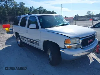 2003 GMC Yukon SLT with VIN 1GKEC13Z83R143232, listed as a IAAI auction lot 41655509 with 148,574 mi miles. Bid and sale history available at carsss.com. Image 1.
