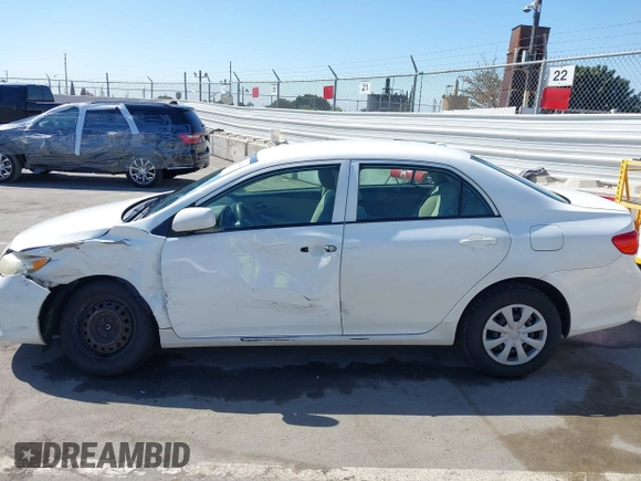 2010 Toyota Corolla with VIN 1NXBU4EE2AZ223753, listed as a IAAI auction lot 42024028 with 204,029 mi miles. Bid and sale history available at carsss.com. Image 14.