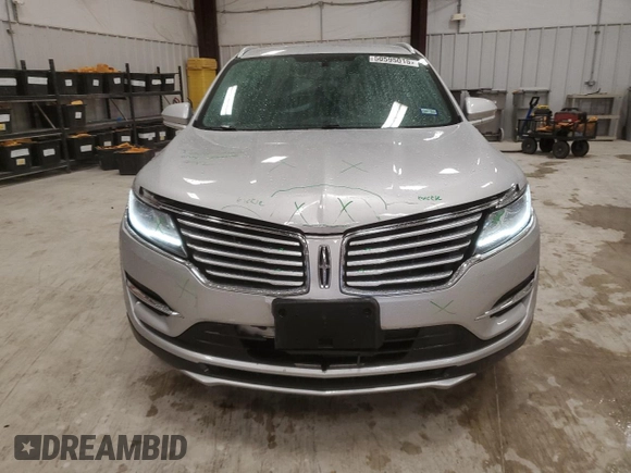 2018 Lincoln MKC Premiere with VIN 5LMCJ1C90JUL07472, listed as a Copart auction lot 50595015 with 74,989 mi miles and Salvage Title. Bid and sale history available at DreamBid. Image 5.