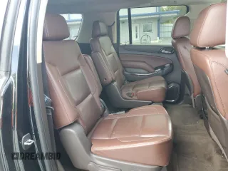 2015 Chevrolet Suburban LTZ with VIN 1GNSKKKC4FR119803, listed as a Copart auction lot 51416775 with 135,366 mi miles and Salvage Title. Bid and sale history available at DreamBid. Image 11.