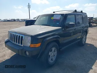 2008 Jeep Commander Sport with VIN 1J8HG48K38C111866, listed as a IAAI auction lot 41469973 with 201,781 mi miles. Bid and sale history available at carsss.com. Image 2.