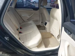 2014 Volkswagen Passat SE w/Sunroof with VIN 1VWBT7A36EC093451, listed as a IAAI auction lot 41682706 with 165,693 mi miles. Bid and sale history available at carsss.com. Image 8.