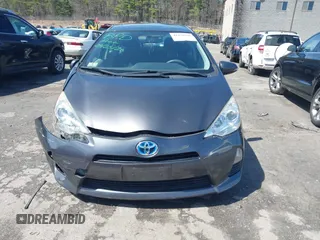 2014 Toyota Prius One z VIN JTDKDTB32E1070932, wystawiony jako IAAI lot #41950966 z przebiegiem 93 952 mil mil oraz . Historia ofert i sprzedaży dostępna na DreamBid. Obrazek 12.