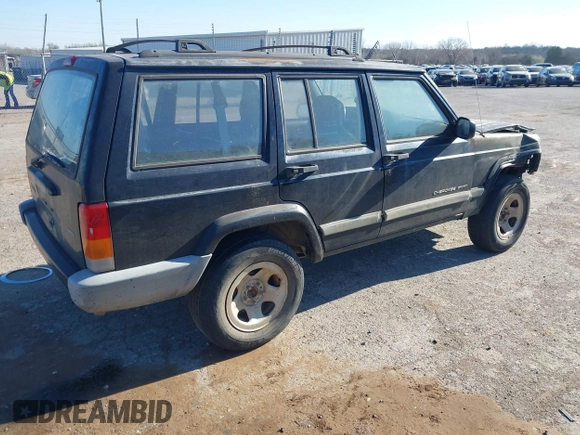 2001 Jeep Cherokee Sport with VIN 1J4FT48SX1L581192, listed as a IAAI auction lot 41828841 with 315,822 mi miles. Bid and sale history available at carsss.com. Image 4.