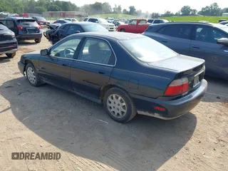 1997 Honda Accord with VIN 1HGCE6647VA022950, listed as a IAAI auction lot 42544823 with 269,804 mi miles and . Bid and sale history available at DreamBid. Image 3.