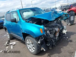 2022 Jeep Renegade Latitude z VIN ZACNJDB1XNPN66679, wystawiony jako IAAI lot #42195768 z przebiegiem 31 272 mil mil oraz . Historia ofert i sprzedaży dostępna na DreamBid. Obrazek 1.