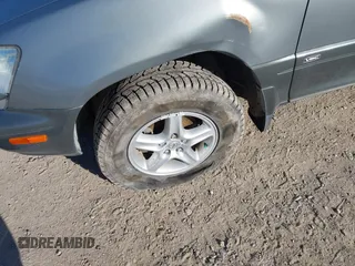 2002 Lexus RX 300 z VIN JTJHF10U120256528, wystawiony jako IAAI lot #42017872 z przebiegiem 157 373 mil mil oraz . Historia ofert i sprzedaży dostępna na DreamBid. Obrazek 13.